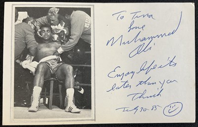 Lot 510 - MUHAMMAD ALI - An autographed post card,...