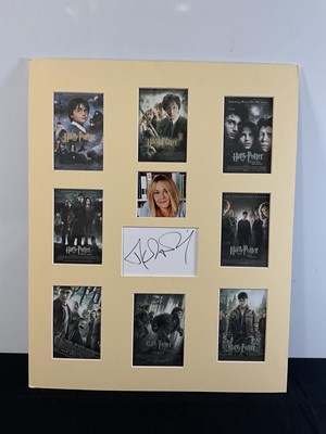 Lot 430 - J. K. ROWLING - A cardboard display featuring...