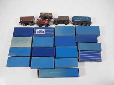 Lot 27 - A group of HORNBY DUBLO 3-rail OO gauge boxed...