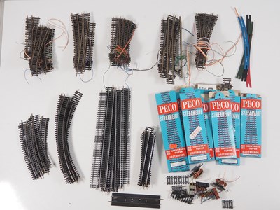 Lot 64 - A quantity of OO gauge track (mostly PECO) to...