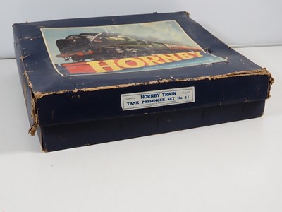 Lot 71 - A HORNBY O gauge clockwork train set together...
