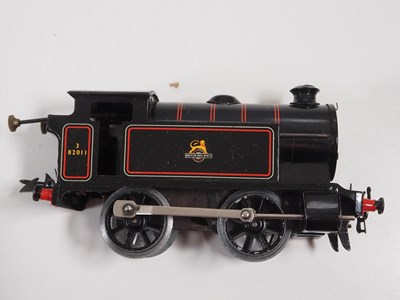 Lot 71 - A HORNBY O gauge clockwork train set together...