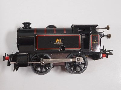 Lot 71 - A HORNBY O gauge clockwork train set together...