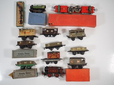 Lot 73 - A group of O gauge boxed and unboxed rolling...