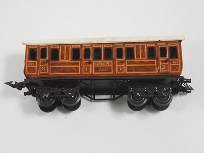 Lot 75 - A BING O gauge 1920s clockwork 0-4-0 steam...