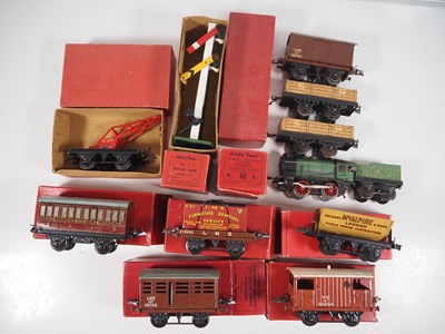 Lot 81 - A quantity of boxed and unboxed HORNBY O gauge...