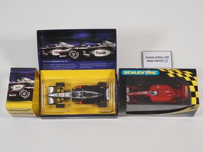 Lot 94 - A pair of SCALEXTRIC Formula 1 slot cars...