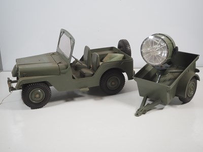 Lot 97 - A MARX TOYS Jeep and Searchlight Trailer,...