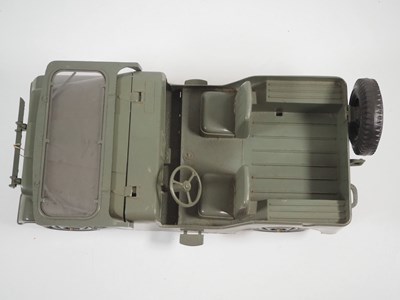Lot 97 - A MARX TOYS Jeep and Searchlight Trailer,...