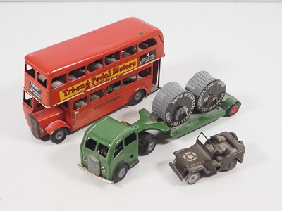 Lot 107 - A group of TRI-ANG MINIC tinplate vehicles...