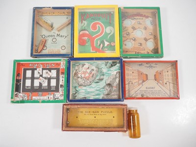 Lot 110 - A group of ball bearing style puzzle games,...