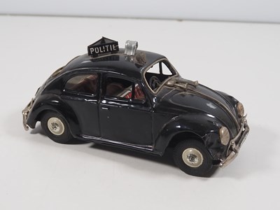 Lot 120 - A BANDAI (Japan) Volkswagen Beetle Police Car -...