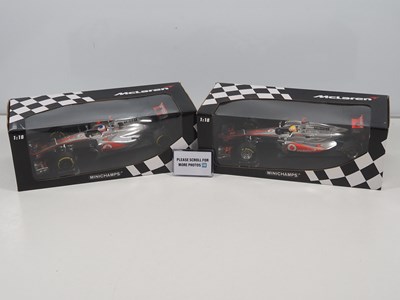 Lot 234 - A pair of MINICHAMPS 1:18 scale McLaren...