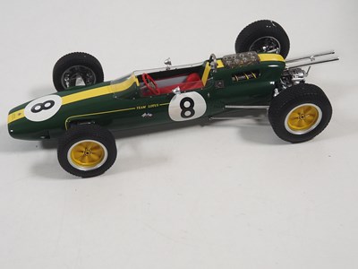 Lot 255 - A pair of SPARK 1:18 Team Lotus Formula 1 cars,...
