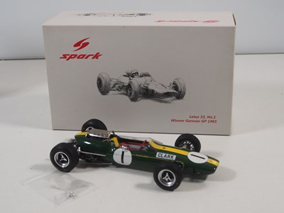 Lot 255 - A pair of SPARK 1:18 Team Lotus Formula 1 cars,...