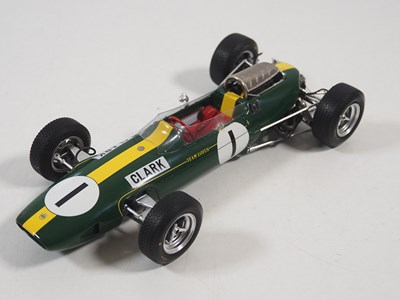 Lot 255 - A pair of SPARK 1:18 Team Lotus Formula 1 cars,...