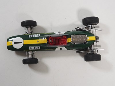 Lot 255 - A pair of SPARK 1:18 Team Lotus Formula 1 cars,...