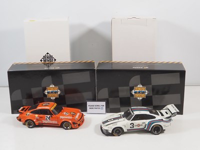 Lot 272 - A pair of EXOTO 1:18 scale Porsche race cars,...