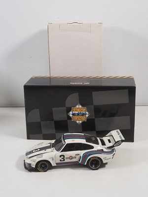 Lot 272 - A pair of EXOTO 1:18 scale Porsche race cars,...
