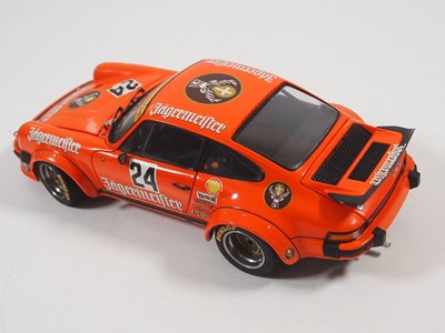 Lot 272 - A pair of EXOTO 1:18 scale Porsche race cars,...