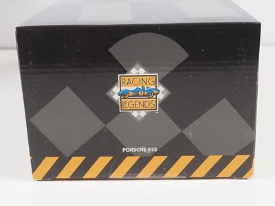 Lot 272 - A pair of EXOTO 1:18 scale Porsche race cars,...