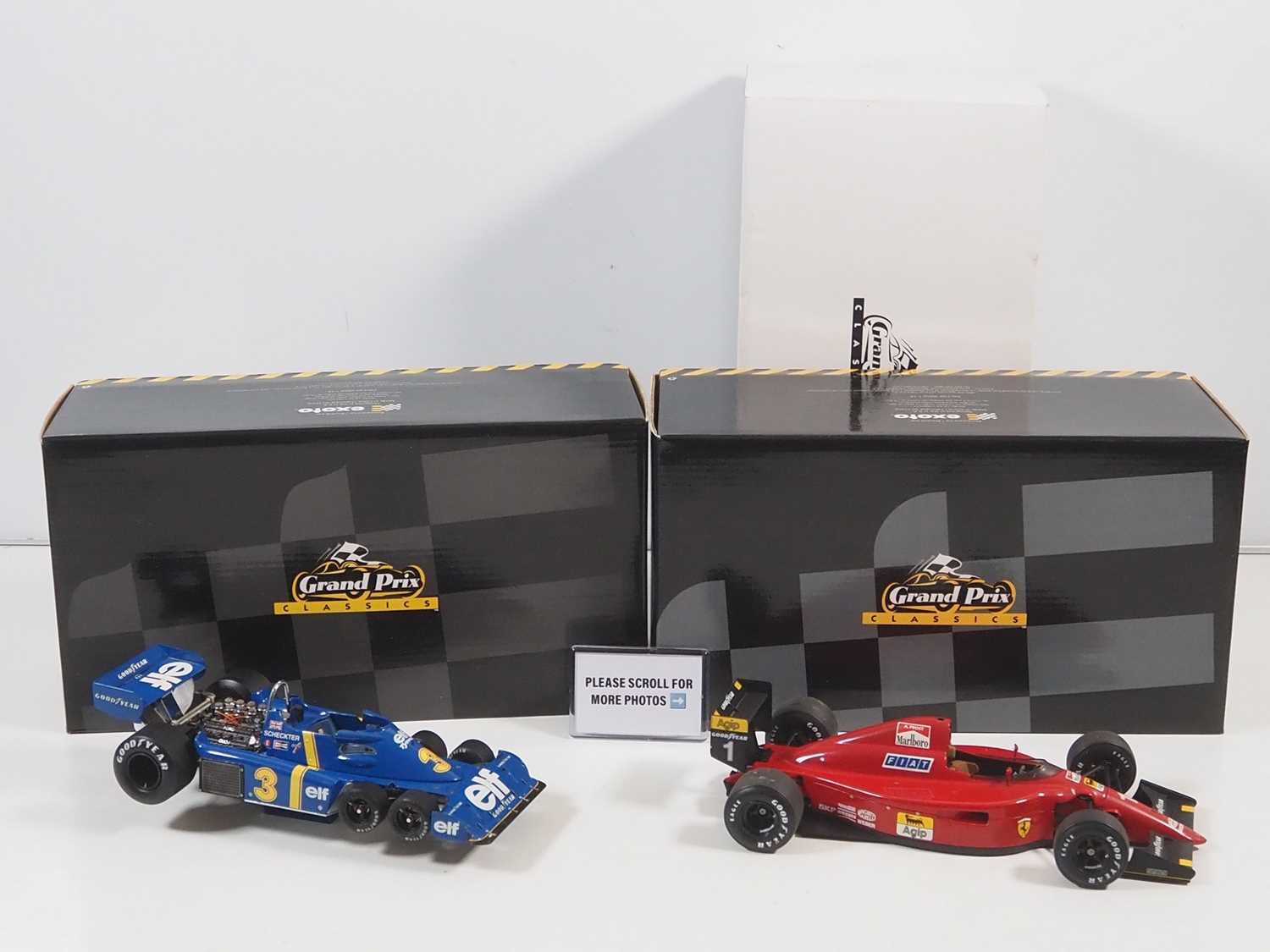 Lot 274 - A pair of EXOTO 1:18 scale Formula 1 race cars...