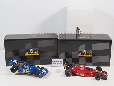 Lot 274 - A pair of EXOTO 1:18 scale Formula 1 race cars...