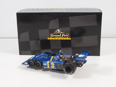 Lot 274 - A pair of EXOTO 1:18 scale Formula 1 race cars...