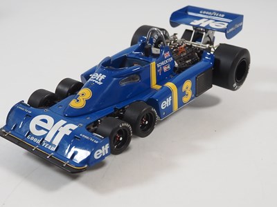Lot 274 - A pair of EXOTO 1:18 scale Formula 1 race cars...