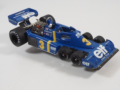Lot 274 - A pair of EXOTO 1:18 scale Formula 1 race cars...