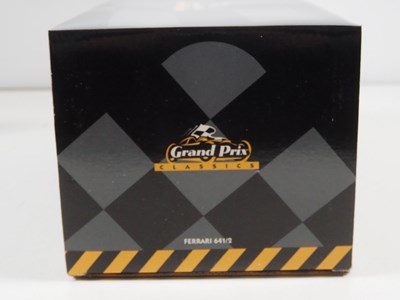 Lot 274 - A pair of EXOTO 1:18 scale Formula 1 race cars...