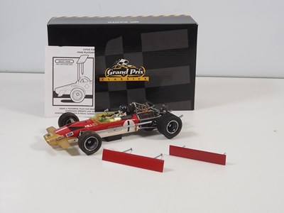 Lot 275 - A pair of EXOTO 1:18 scale Lotus Ford Formula...