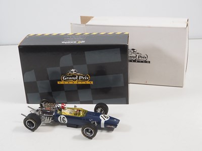 Lot 275 - A pair of EXOTO 1:18 scale Lotus Ford Formula...