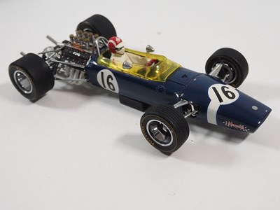 Lot 275 - A pair of EXOTO 1:18 scale Lotus Ford Formula...