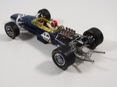 Lot 275 - A pair of EXOTO 1:18 scale Lotus Ford Formula...