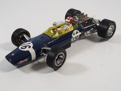 Lot 275 - A pair of EXOTO 1:18 scale Lotus Ford Formula...