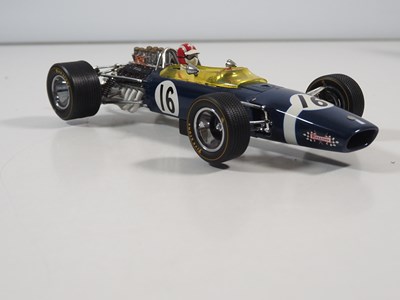 Lot 275 - A pair of EXOTO 1:18 scale Lotus Ford Formula...
