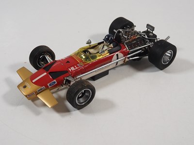Lot 275 - A pair of EXOTO 1:18 scale Lotus Ford Formula...