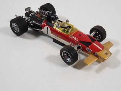 Lot 275 - A pair of EXOTO 1:18 scale Lotus Ford Formula...
