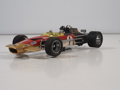 Lot 275 - A pair of EXOTO 1:18 scale Lotus Ford Formula...