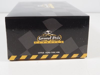 Lot 275 - A pair of EXOTO 1:18 scale Lotus Ford Formula...