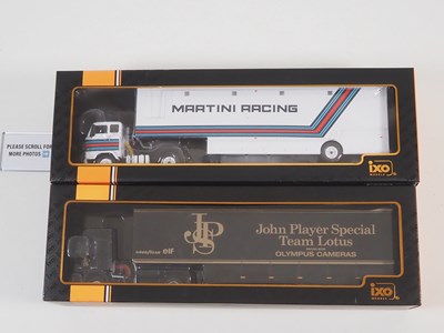 Lot 303 - A pair of IXO 1:43 scale Volvo racing team...
