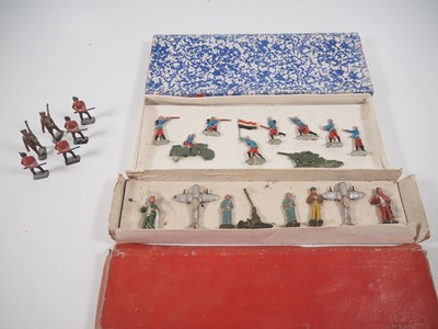 Lot 418 - A pair of pre-war / WWII cast solider sets,...