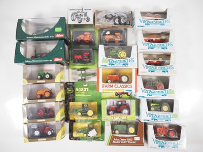 Lot 463 - A group of boxed diecast tractors by SCHUCO,...