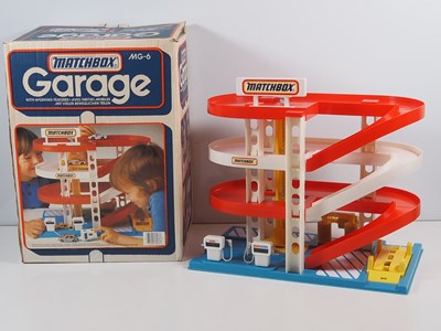 Lot 517 - A MATCHBOX MG6 plastic garage set in original...