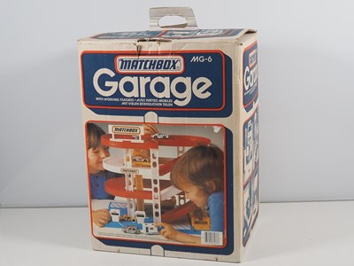 Lot 517 - A MATCHBOX MG6 plastic garage set in original...