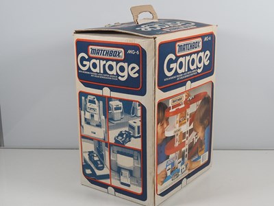 Lot 517 - A MATCHBOX MG6 plastic garage set in original...