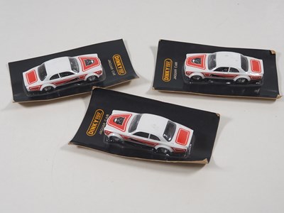 Lot 535 - A group of 3 carded Jaguars labelled 'DINKY...
