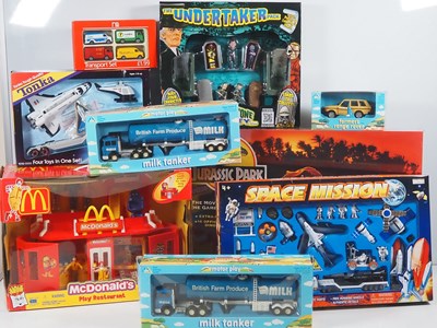 Lot 545 - A collection of children's toys and playsets...