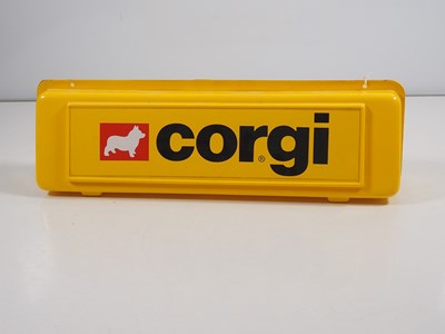 Lot 551 - A CORGI double sided moulded plastic shop...